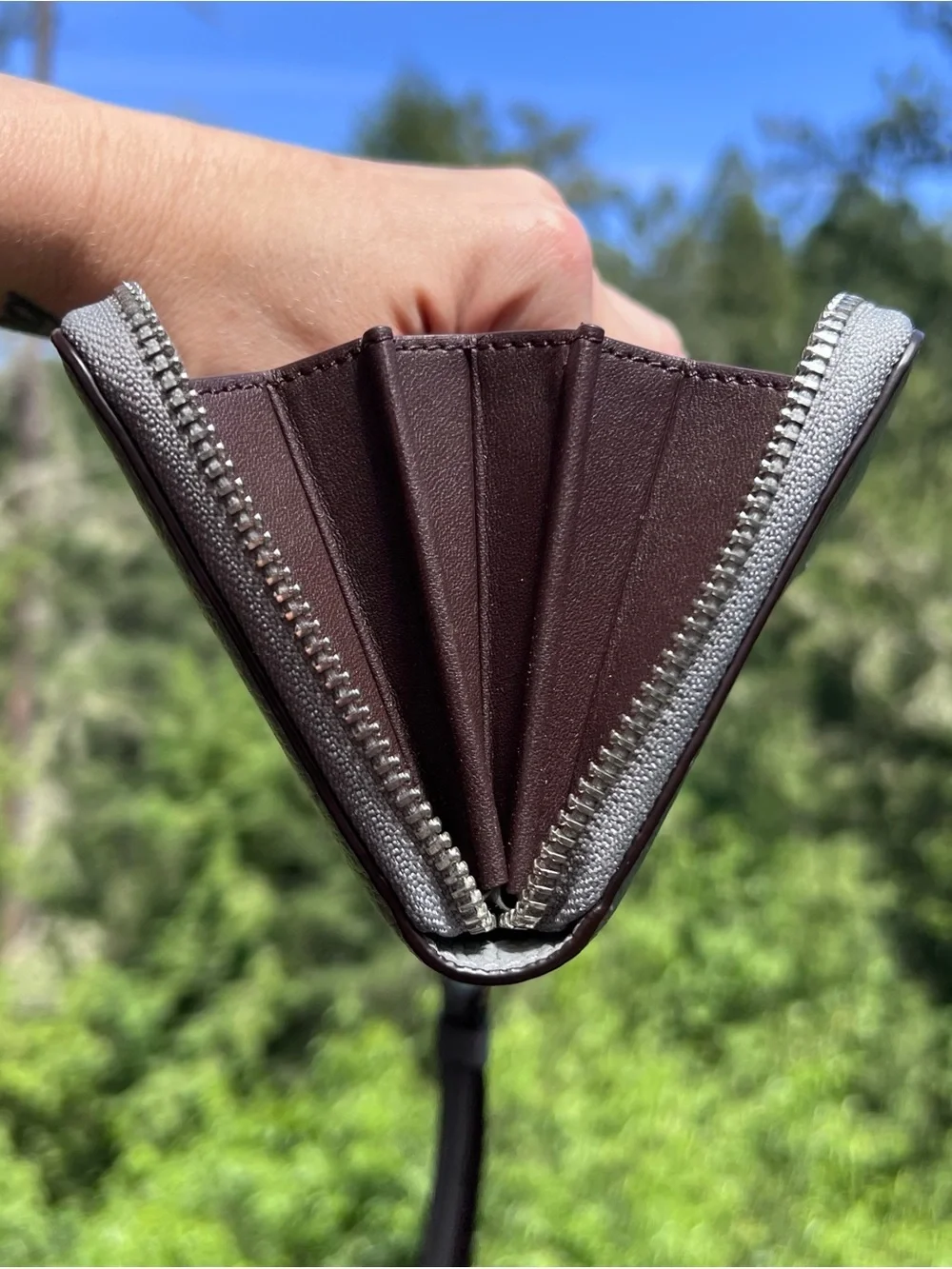 Coach accordion zip
